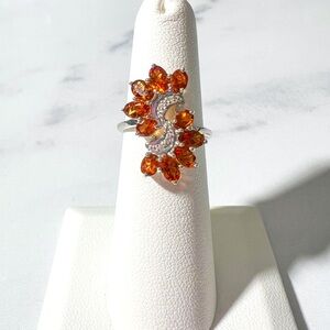 2.64ctw Oval Mandarin Garnet & White Zircon Rhodium Over Sterling Silver Ring